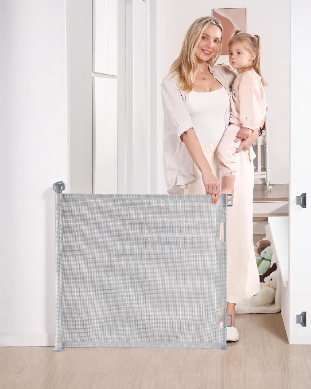 Photo 1 of Retractable Baby Gate, Mesh Baby and Pet Gate 33" Tall, Extends up to 55" Wide, Child Safety Baby Gates for Stairs Doorways Hallways, Dog Gate Cat Gate for Indoor and Outdoor (Gray)

