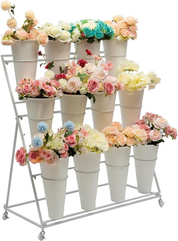 Photo 1 of 3 Tiers Metal Flower Plant Display Stand Shelf with Wheels and 12 Flower Buckets, 3 Layers Indoor Outdoor Moving Florist Bouquet Shelf, for Patio Garden, Living Room, Florist (White)
