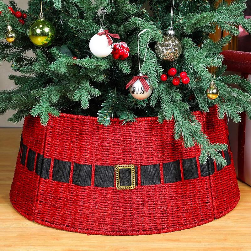 Photo 1 of Poen Rattan Red Christmas Tree Collar for Artificial Trees 23.6 Inch Christmas Santa's Belt Tree Basket Base Tree Collar Farmhouse Wicker Christmas Tree Skirt Cover for Rustic Party Decoration
