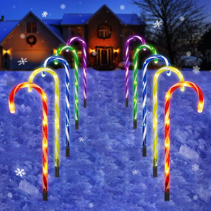 Photo 1 of Candy Cane Outdoor Landscape Lights - 10 Pack 60 Warm LEDs 21in Lighted Christmas Path String Lights with Memory Function 8 Flash Modes End-to-End Plug in Waterproof Xmas Colorful Outside Decorations
