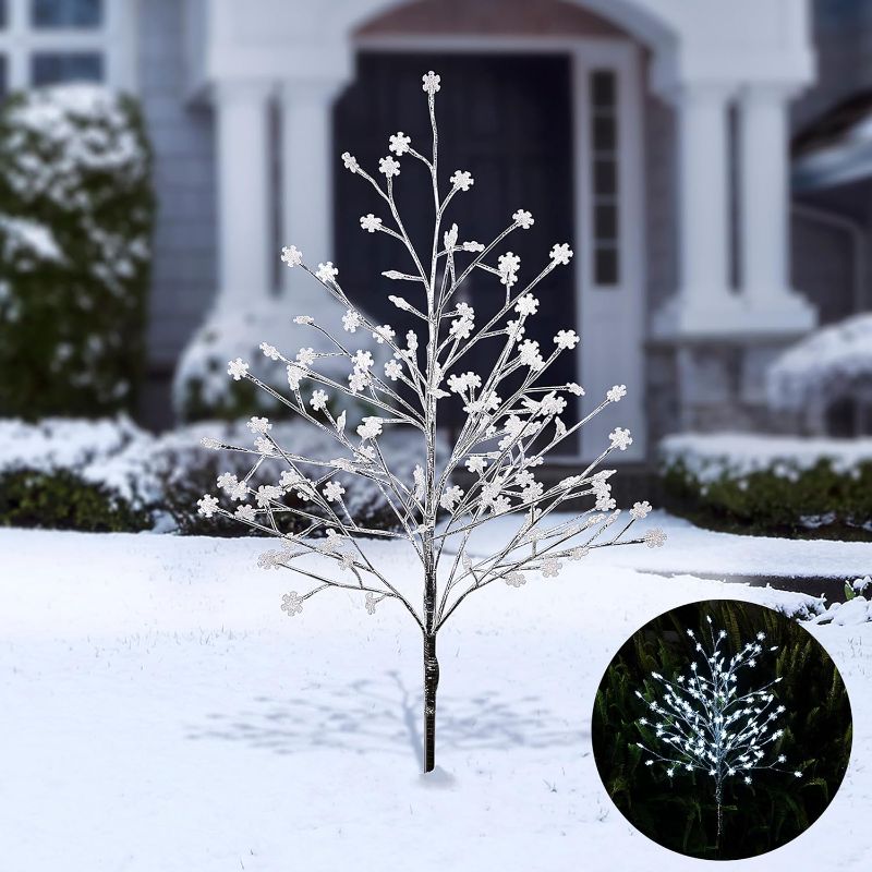 Photo 1 of Alpine Corporation 58" H Indoor/Outdoor Frosty Christmas Snowflake Tree with LED Lights
