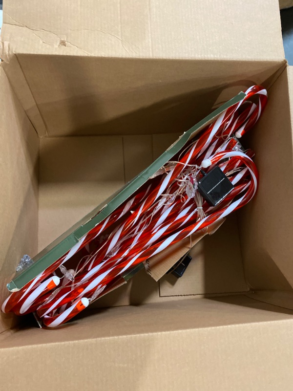 Photo 1 of Solar Christmas Candy Cane Lights,Red Lights 12Pack 28" Upgraded Pathway Stake Lights Outdoor, 8 Modes 2000MAH Lights Walkway Outdoor Markers with Stakes for Garden Patio Xmas Decorations…
