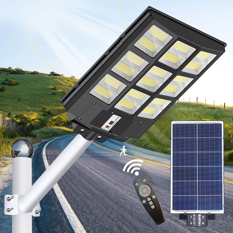 Photo 1 of 800W Led Solar Street Light Outdoor, 64000LM IP66 Waterproof Solar Outdoor Lights Motion Sensor with Remote Control & Arm Pole, Dusk to Dawn Solar Street Light for Garden Yard Parking Lot
