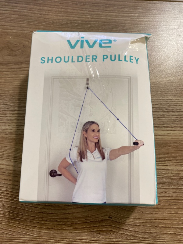 Photo 2 of Vive Shoulder Pulley for Physical Therapy - Rotator Cuff Pain Pulley System - Over Door Rehab Exerciser - with Durable Metal Pulley & Comfortable Padded Handles (FSA/HSA Approved)
