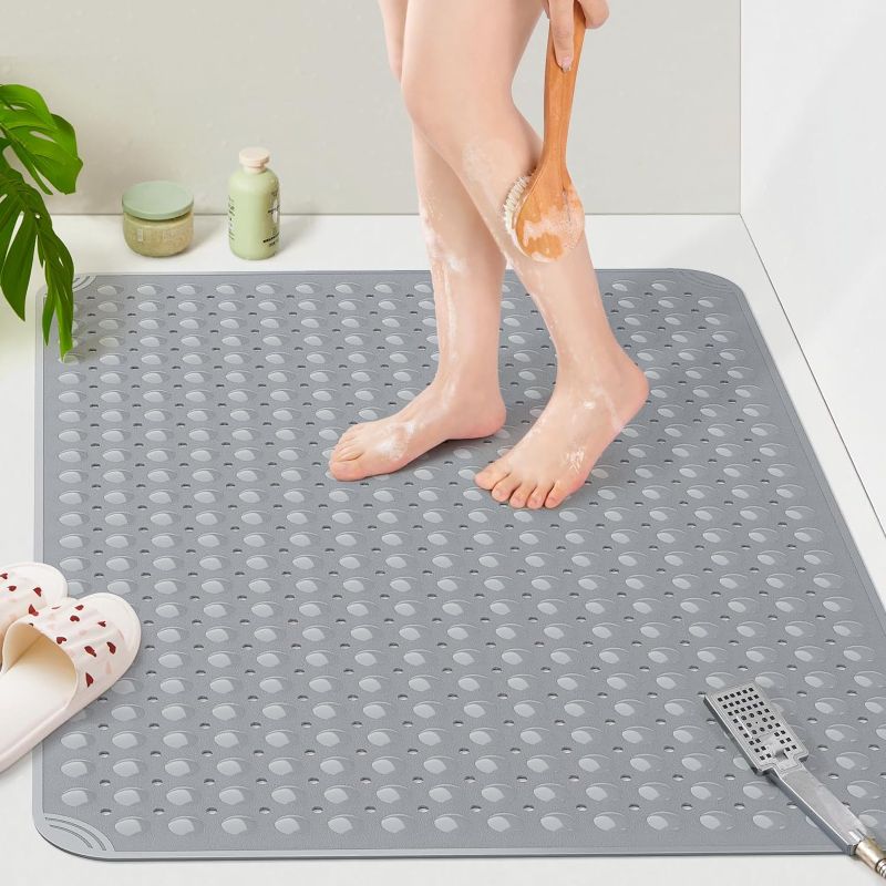 Photo 1 of Yolife Extra Large TPE Shower Mat, 47.2" L x 31.5" W Anti Slip Bath Mat with Drain Holes and Suction Cups, Large Size Mat More Suitable for Shower Stall, No Odor, Heavy Mat
