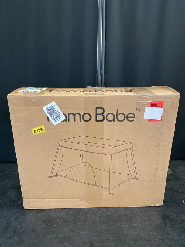 Photo 1 of Pamo Babe Mini Travel Crib for Baby Safe Lightweight Portable Crib for Toddlers 1-2 with Soft Mattress Pad Compact Play Yard with Handbag Design Indoor and Outdoor Baby Travel Bed(Black)
