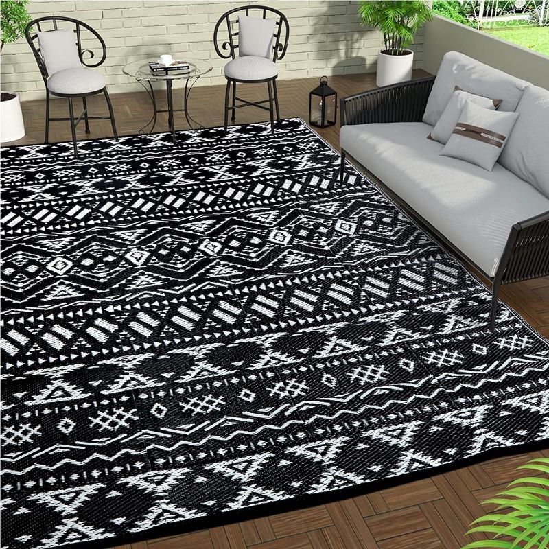 Photo 1 of Reversible Mats - Outdoor Rugs 5'x8' for Patios Clearance, Plastic Straw Rugs Waterproof, Portable, Large Floor Mat and Rugs for Outdoor RV, Balcony, Picnic, Beach, Camping(Black & Cream White)
