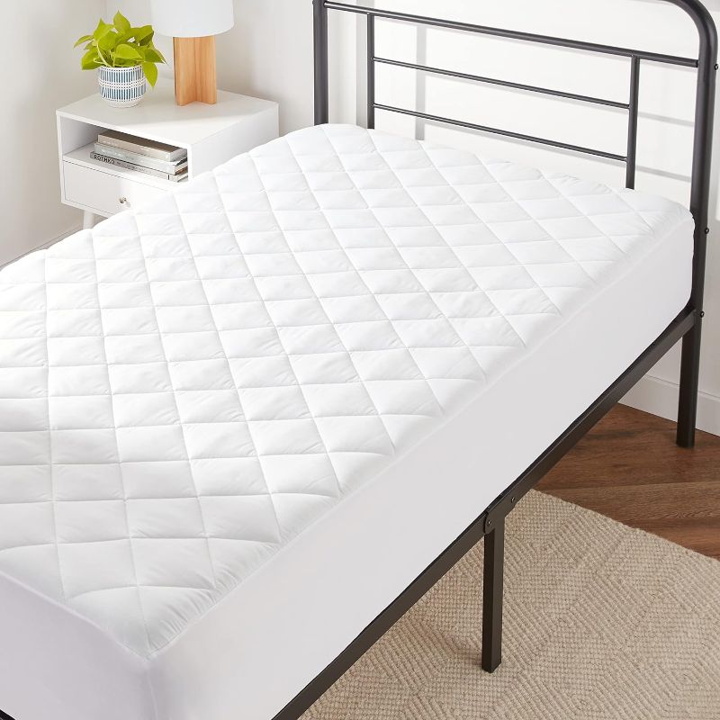 Photo 1 of Amazon Basics Hypoallergenic Quilted Mattress Topper Pad, 18 Inches Deep, Twin, White
