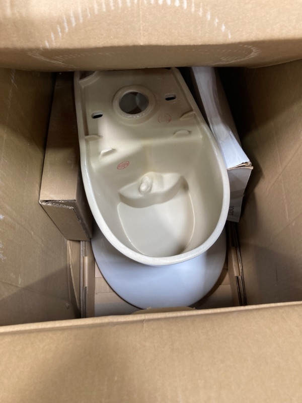Photo 1 of 12 in. Rough in 2-Piece 1.1 GPF/1.6 GPF Dual Flush Round Toilet in White Seat Included
