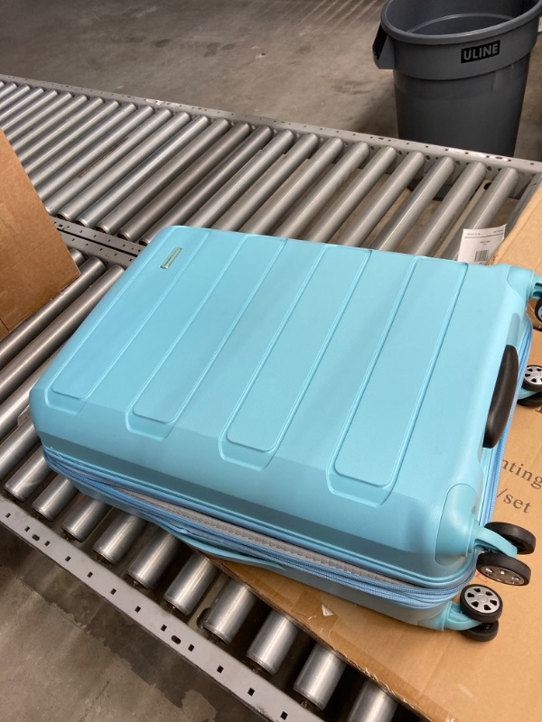 Photo 1 of Traveler's Choice Pagosa Indestructible Hardshell Expandable Spinner Luggage, Baby Blue, Check-in Only
