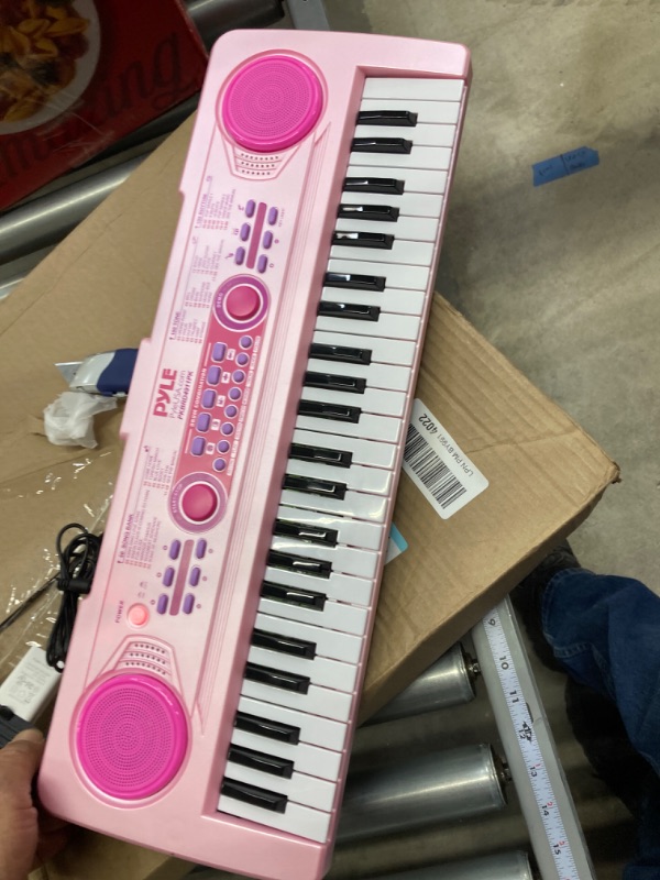 Photo 2 of PYLE-PRO Electric Keyboard Piano for Kids-Portable 49 Key Electronic Musical Karaoke Keyboard, Learning Keyboard for Children w/Drum Pad, Recording, Microphone, Built-in Speaker-PKBRD4911PK (Pink) Pink Keyboard