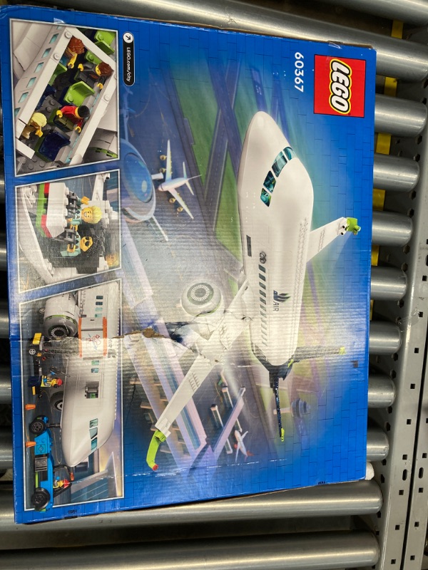 Photo 2 of ***box is damaged*** Lego City Passenger Airplane 60367 Building Toy Set; Fun Airplane STEM Toy for Kids with a Large Airplane, Passenger Bus, Luggage Truck, Container Loader, and 9 Minifigures Standard Packaging