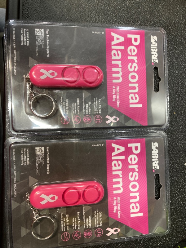 Photo 2 of **BUNDLE OF 2 ***SABRE Personal Alarm With Key Ring, 120dB Alarm, Audible Up To 1,280 Feet (390 Meters), Simple Operation, Reusable, Pink Pink Personal Alarm (NBCF) Alarm