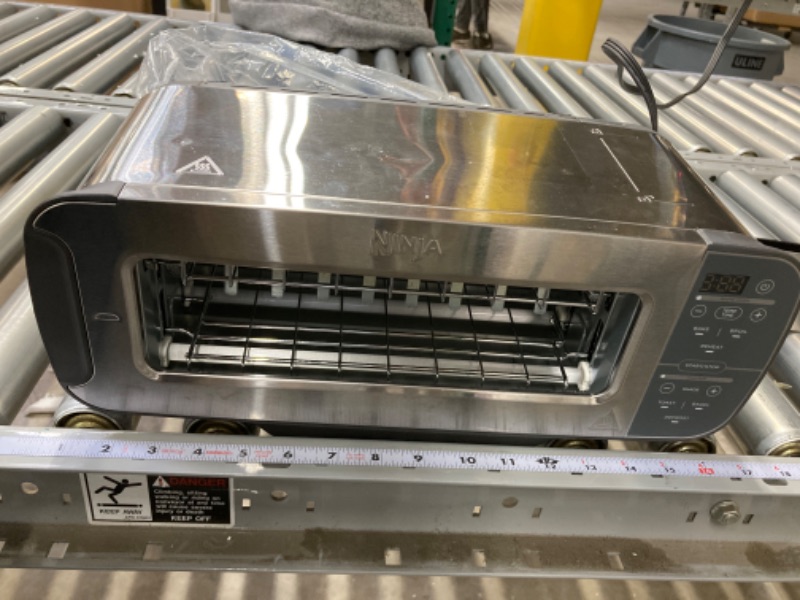 Photo 1 of Ninja ST101 Foodi 2-in-1 Flip Toaster, 2-Slice Capacity, Compact Toaster Oven, Snack Maker, Reheat, Defrost, 1500 Watts, Stainless Steel 6 Functions