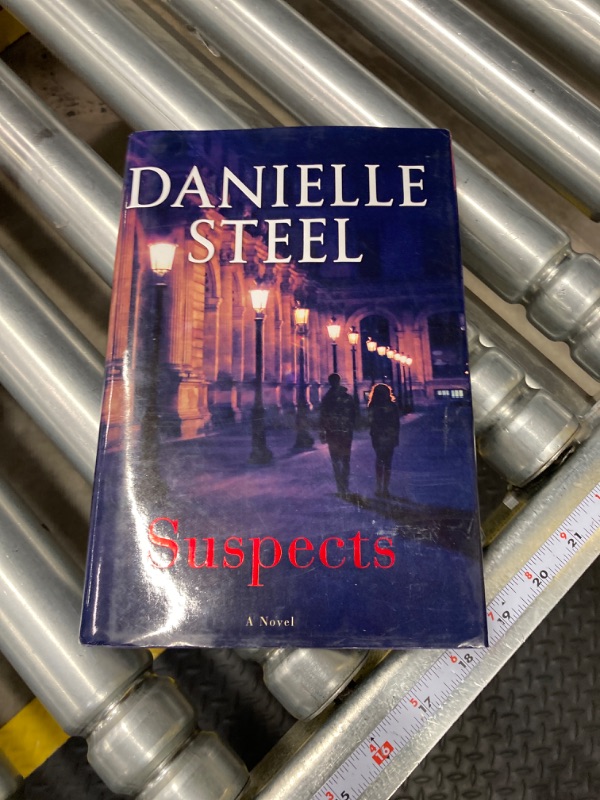 Photo 2 of Suspects: A Novel Hardcover – June 28, 2022
