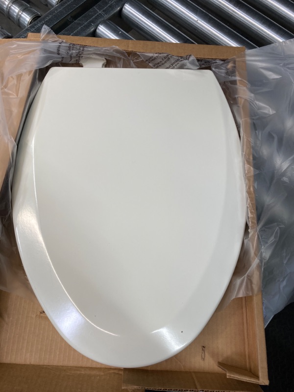 Photo 2 of Bemis 1500EC 346 Toilet Seat with Easy Clean & Change Hinges, Elongated, Durable Enameled Wood, Biscuit/Linen Biscuit/Linen Elongated