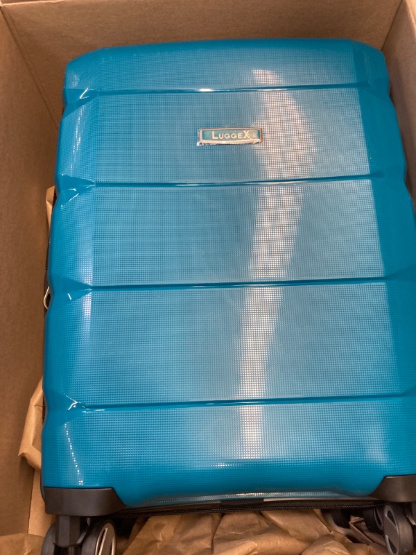 Photo 2 of 
medium blue lugeex individual suitcase.