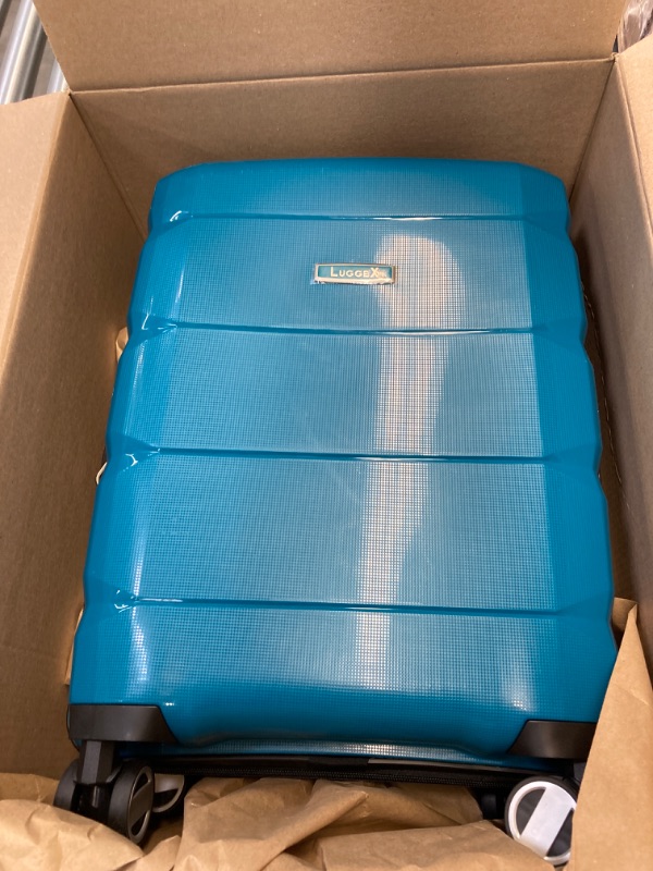 Photo 1 of 
medium blue lugeex individual suitcase.
