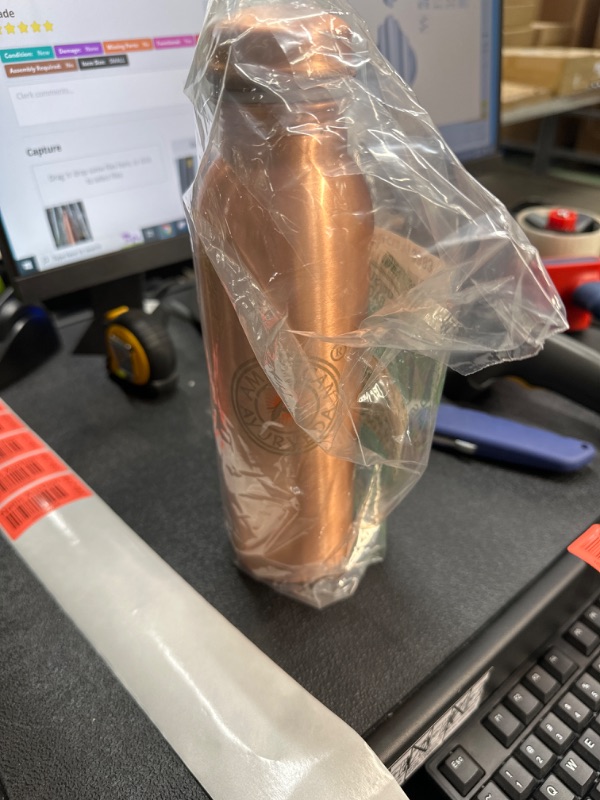 Photo 1 of American Ayurveda Rose Gold Bottle