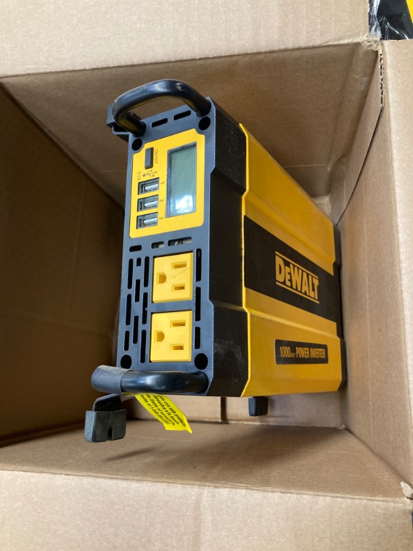 Photo 2 of DEWALT DXAEPI1000 Power Inverter 1000W Car Converter & DXAEPI140 Power Inverter 140W Car Converter: 12V DC to 120V AC Power Outlet with Dual 3.1A USB Ports Car Converter + Car Converter
******(PLEASE ADVISE  AC POWER OUTLET CORD NOT INCLUDED)********