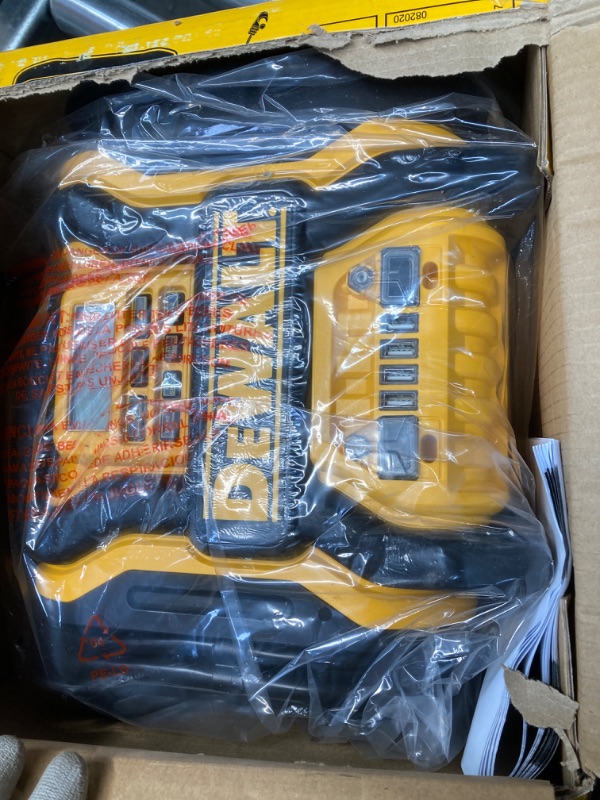 Photo 1 of DEWALT DXAEPS14 1600 Peak Battery Amp 12V Automotive Jump Starter/Power Station with 500 Watt AC Power Inverter, 120 PSI Digital Compressor, and USB Power , Yellow
