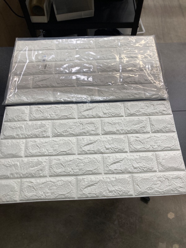 Photo 3 of Arthome WALL DECOR White Brick 3D Wall Panels Peel and Stick Wallpaper for Living Room Bedroom Background Wall Decoration (2 Pack, White 11.4 sq feet) White 2 Pack 11.5 Sq.ft