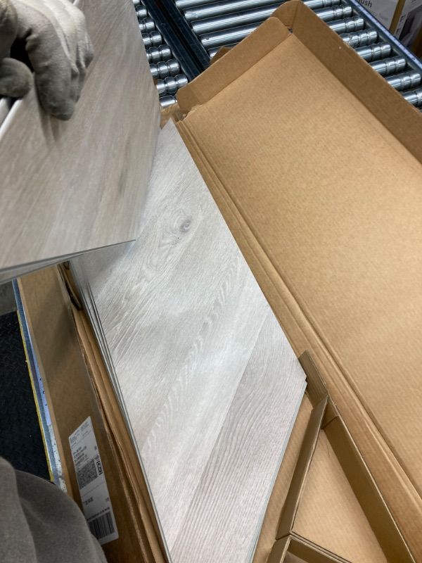 Photo 1 of Chevron Champagne Beach Wood 12 MIL x 12 in. W x 28 in. L Click Lock Waterproof Vinyl Plank Flooring (18.87 sqft/case)