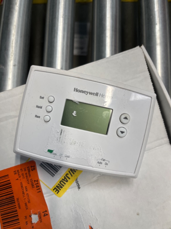 Photo 1 of 1-Week Programmable Thermostat with Digital Display