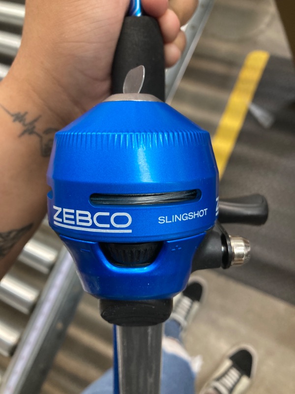 Photo 3 of Zebco Slingshot Spincast Reel and Fishing Rod Combo, 5-Foot 6-Inch 2-Piece Fishing Pole, Size 30 Reel, Right-Hand Retrieve, Pre-Spooled with 10-Pound Zebco Line Blue