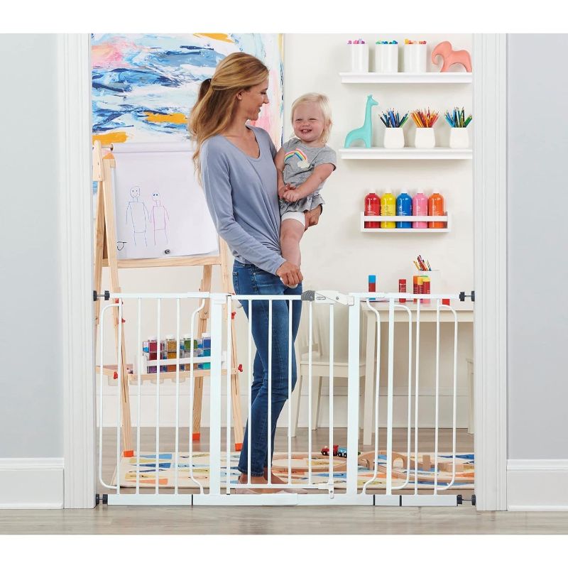 Photo 1 of Regalo 56-Inch Extra WideSpan Walk Through Baby Gate, Includes 4-Inch, 8-Inch and 12-Inch Extension, 8 Piece Set - 4 Pack of Pressure Mounts and 4 Pack of Wall Cups and Mounting Kit, White