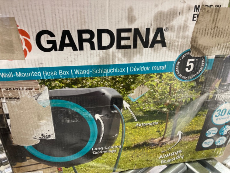 Photo 2 of Gardena Wall-Mounted Hose Box RollUp M 20 m: Flexible watering for medium-sized gardens, swivel hose reel, with wall bracket, system parts and nozzle, including 20 m Gardena hose (18610-20)