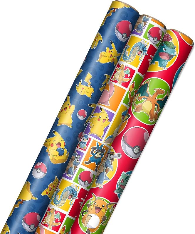 Photo 1 of Hallmark Pokémon Wrapping Paper with Cutlines on Reverse (3 Rolls: 60 Sq. Ft. Ttl) with Pikachu, Charmander, Bulbasaur for Birthdays, Kids Parties, Gamers, Christmas Gifts