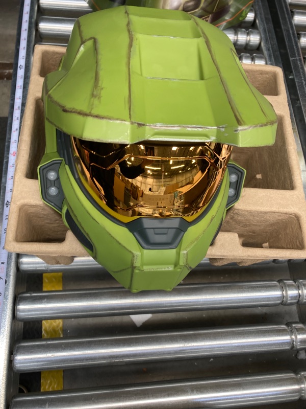 Photo 2 of HALO Master Chief Deluxe Helmet with Stand - LED Lights on Each Side - Battle Damaged Paint - One Size Fits Most - Build Your Halo Universe, Green