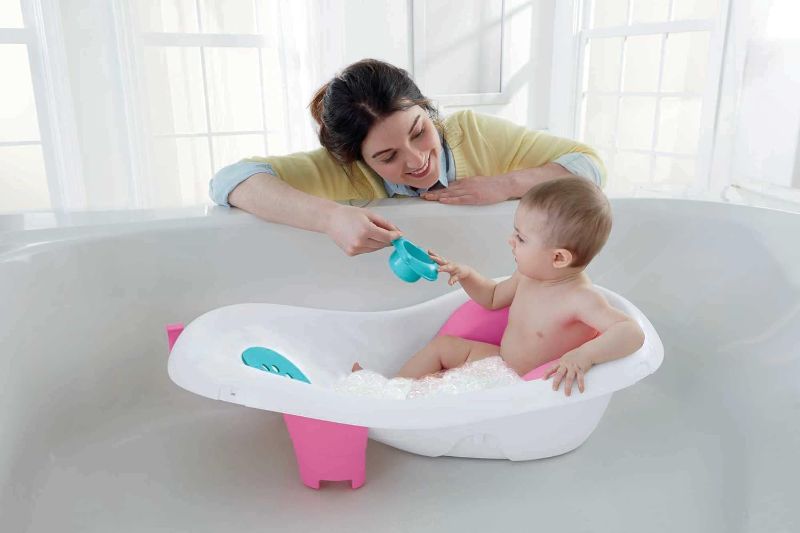 Photo 1 of ***MISSING ITEMS, SEE NOTES*** Fisher-Price Baby To Toddler Bath 4-In-1 Sling ‘N Seat Tub With Removable Infant Support And 2 Toys, Pink