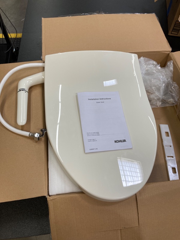 Photo 1 of Kohler K-5724-96 Puretide Elongated Manual Bidet Toilet Seat, White With Quiet-Close Lid And Seat, Adjustable Spray Pressure And Position, Self-Cleaning Wand, No Batteries Or Electrical Outlet Needed Biscuit Elongated Toilet Seat