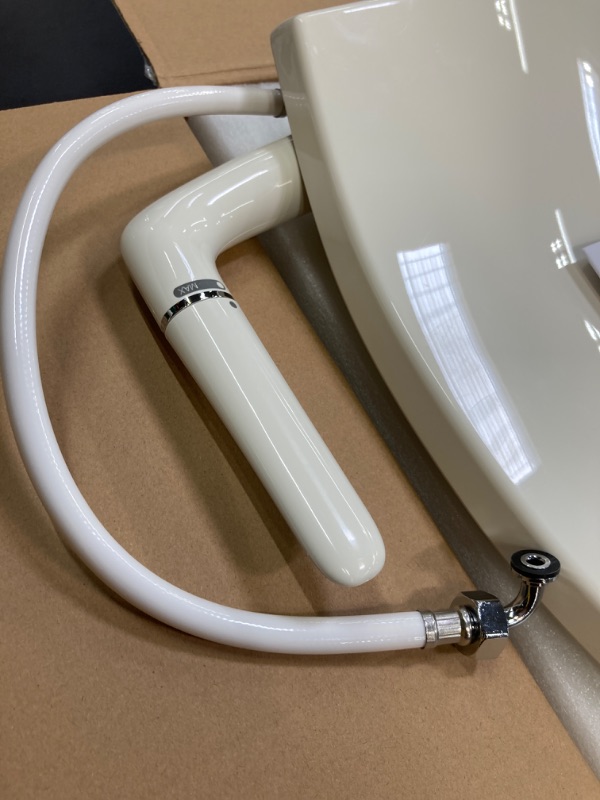 Photo 1 of Kohler K-5724-96 Puretide Elongated Manual Bidet Toilet Seat, White With Quiet-Close Lid And Seat, Adjustable Spray Pressure And Position, Self-Cleaning Wand, No Batteries Or Electrical Outlet Needed Biscuit Elongated Toilet Seat
