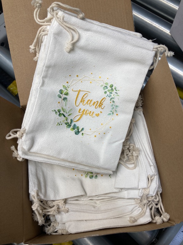 Photo 1 of  2 boxes Windyun 50 Pcs Burlap Gift Bags with Drawstring 7 x 5 Inch Thank You Drawstring Bags Bulk Burlap Sack Reusable Jewelry Pouches for Party Favors Christmas Wedding Birthday Present(White and Green)
