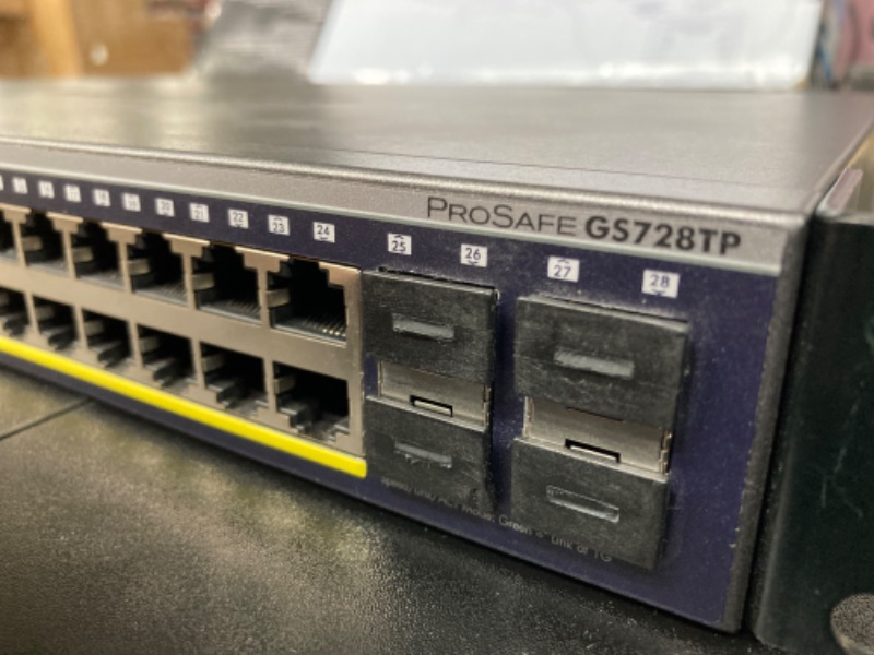 Photo 3 of NETGEAR 28-Port Gigabit Ethernet Smart Managed Pro PoE Switch (GS728TP) - with 24 x PoE+ @ 190W, 4 x 1G SFP, Desktop/Rackmount, and ProSAFE Lifetime Protection