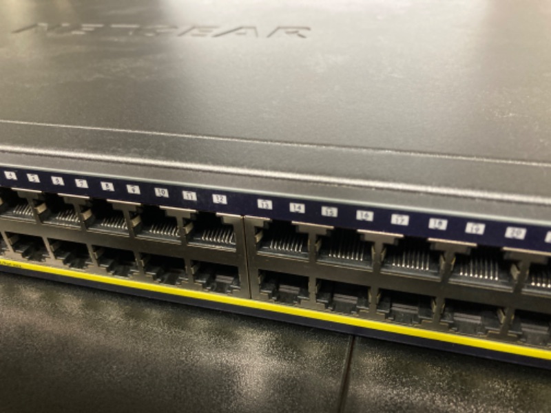 Photo 1 of NETGEAR 28-Port Gigabit Ethernet Smart Managed Pro PoE Switch (GS728TP) - with 24 x PoE+ @ 190W, 4 x 1G SFP, Desktop/Rackmount, and ProSAFE Lifetime Protection