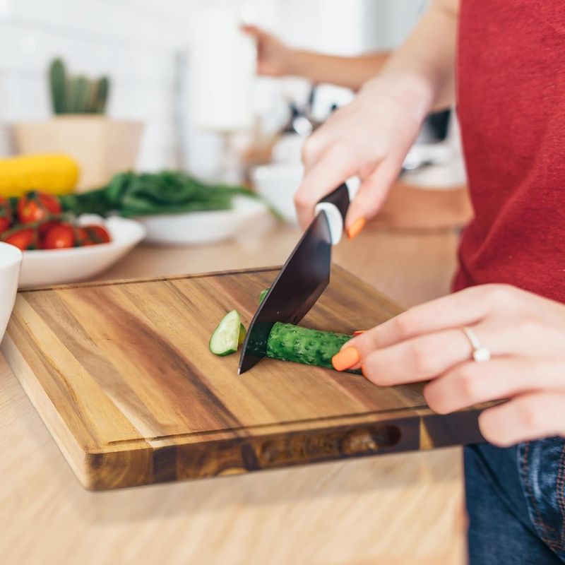 Photo 4 of Acacia Wood Cutting Board Wooden Chopping Boards for Kitchen Charcuterie Boards Reversible Butcher Block with Handles Juice Groove 8 Non Slip Mat for Meat Cheese (12 x 16 Inch)