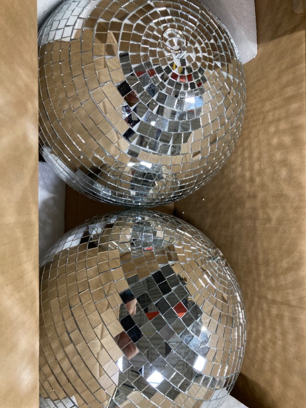 Photo 1 of 2 Pack Large Disco Ball Silver Hanging Mirror Disco Ball Reflective Mirror Disco Ball Ornament for Party Holiday Wedding Dance Music Festivals Decor Club Stage Props DJ Decoration (12 Inch, 12 Inch)