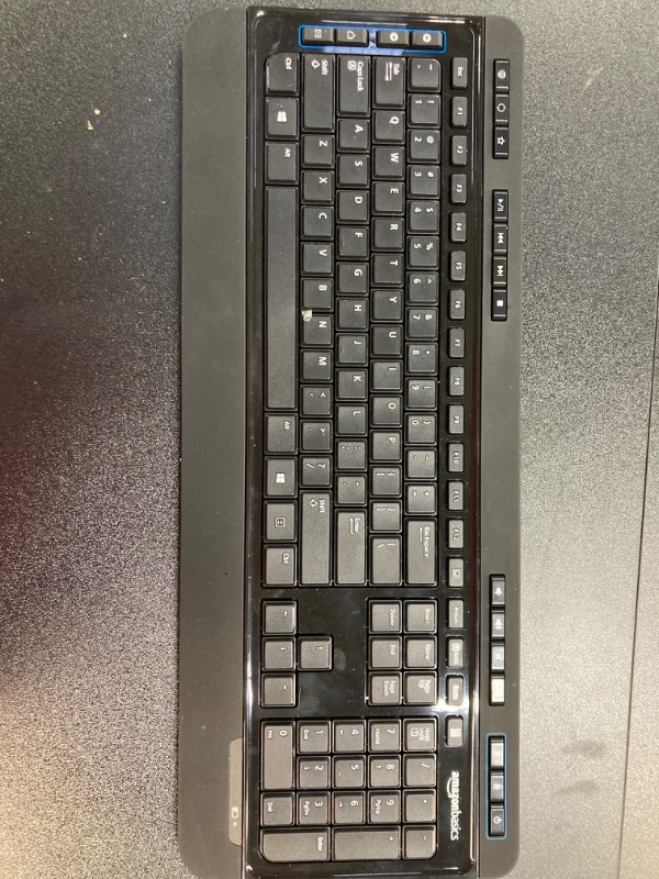 Photo 1 of Amazon Basics Wireless Full Size Computer Keyboard and Mouse Combo, US Layout (QWERTY), Black