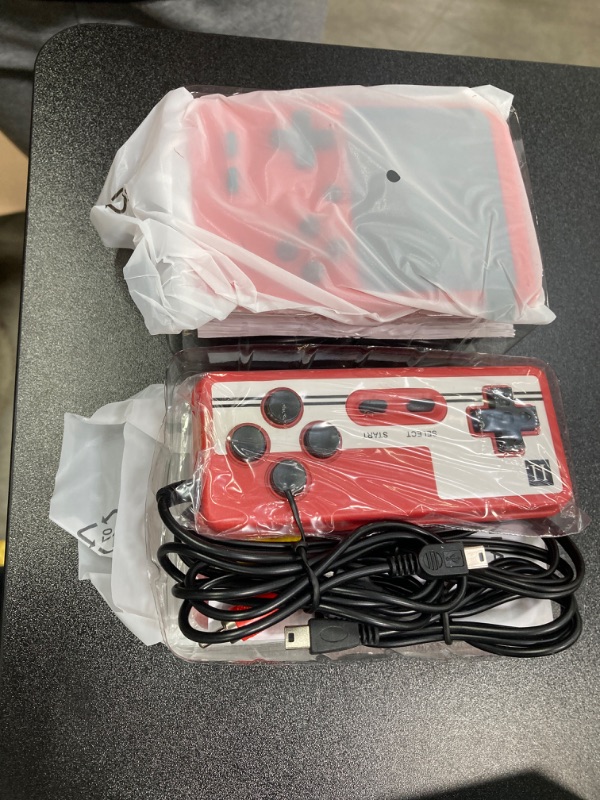 Photo 1 of 2 PACK///NO RETURNS AS IS//Trovono Retro Handheld Game Console, Portable Retro Video Game Console with 500 Classical FC Games, 3.0-Inch Screen 1020mAh Rechargeable Battery Support for Connecting TV and Two Players(Red) Red-500 Games