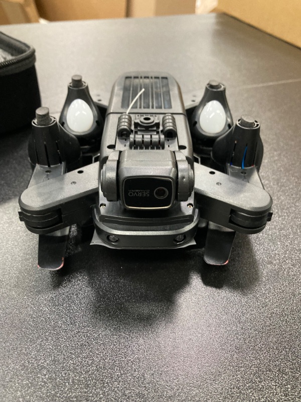 Photo 1 of S8000 Drone with 90° electrically adjustable 4k Camera for Kids and Adults - FPV Live Video Quadcopter equipped with 2 Batteries for up to 40 minutes of flight time - Long range distance up to 300m - 360° flip - Follow me - Auto return - One key take off/
