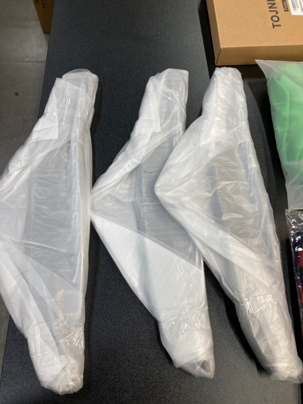 Photo 1 of MISC CLOTHING BUNDLE//HANGERS, FANNY PACKS, SHOELACES AND A SMALL GREEN DRESS