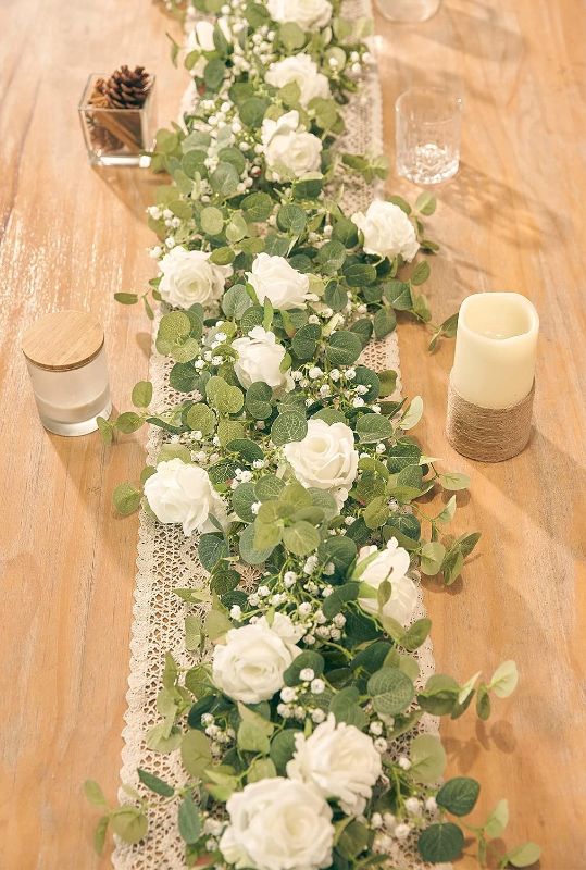 Photo 1 of Anna's Whimsy 5.91FT Artificial Eucalyptus Garland with Flowers, Fake Rose Gypsophila Garland, Faux Floral Garland Greenery Garland for Wedding Spring Home Party Craft Art Table Runner Decor