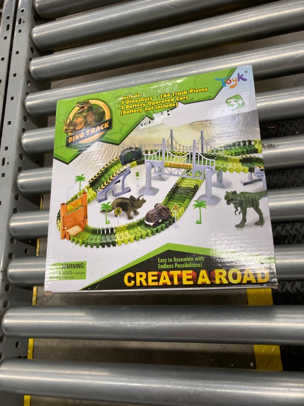 Photo 2 of Boley Dinosaur Adventure Road Creators Playset - 142 Track Pieces and 11 Additional Pieces - Dinosaur Track, Battery Powered Car, and Dinosaurs Included - Perfect Construction Dinosaur Action Playset