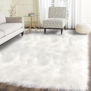 Photo 1 of LARE SPACE AREA FURRY RUG WHITE UNKNOWN SIZING 