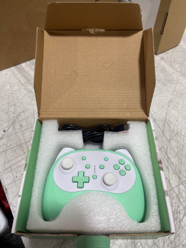 Photo 1 of KINGEAR Wireless Switch Controller, Cute Cat Switch Pro Controller for Switch/Lite/OLED, Gaming Controller Gamepad with Wake-up,Dual Vibration,Gyro Axis,Screenshot & Adjustable Turbo Function Pea Green