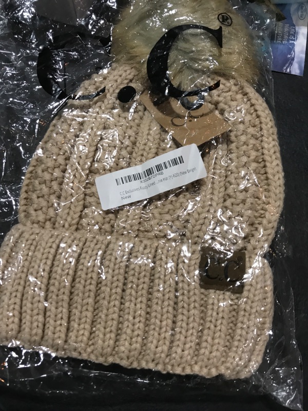 Photo 1 of beige beanie hat 